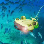 Underwater Inspection Drones With a Claw: Inspect and Retrieve in One Trip